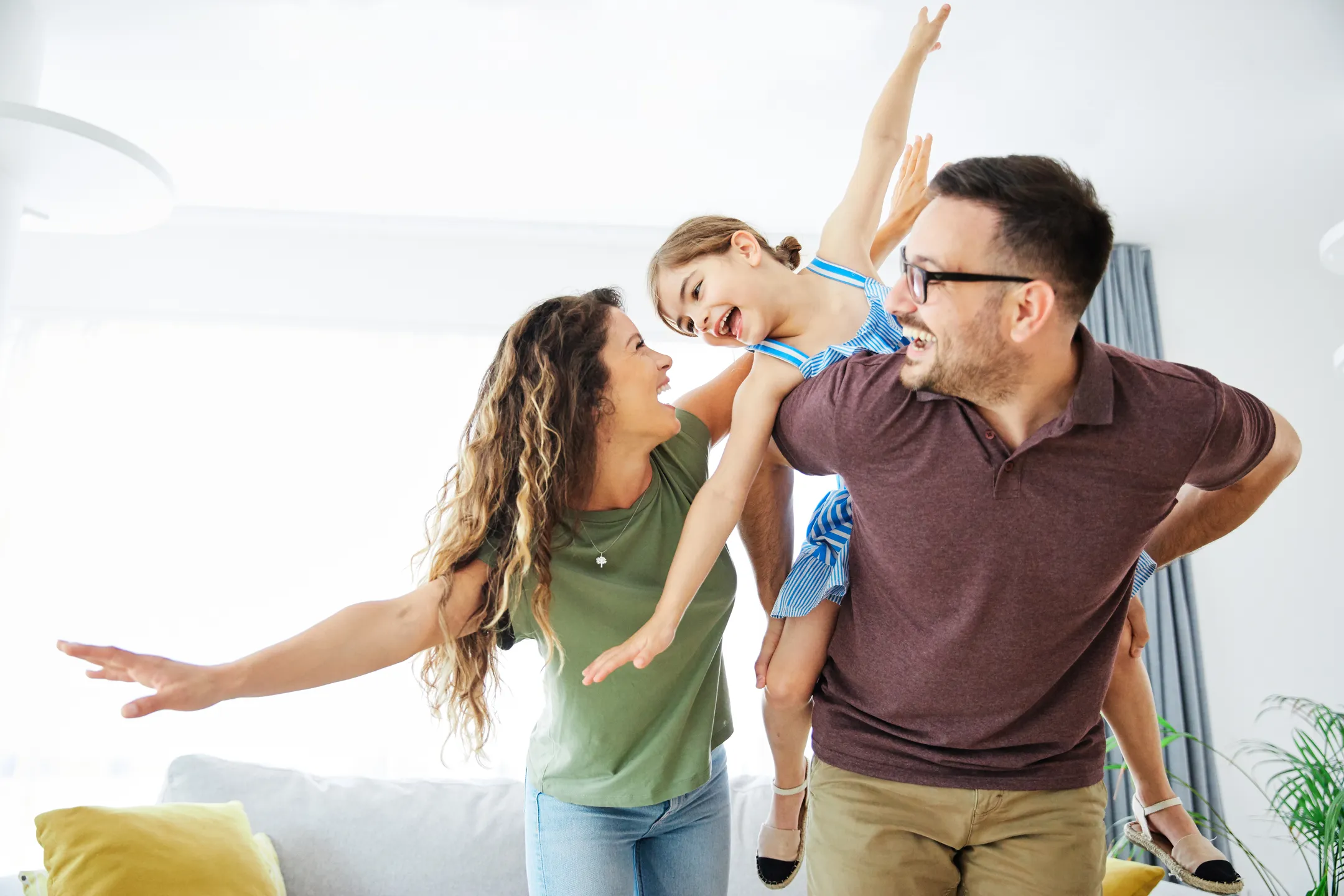 Homeowners in Tavares playing with their child
