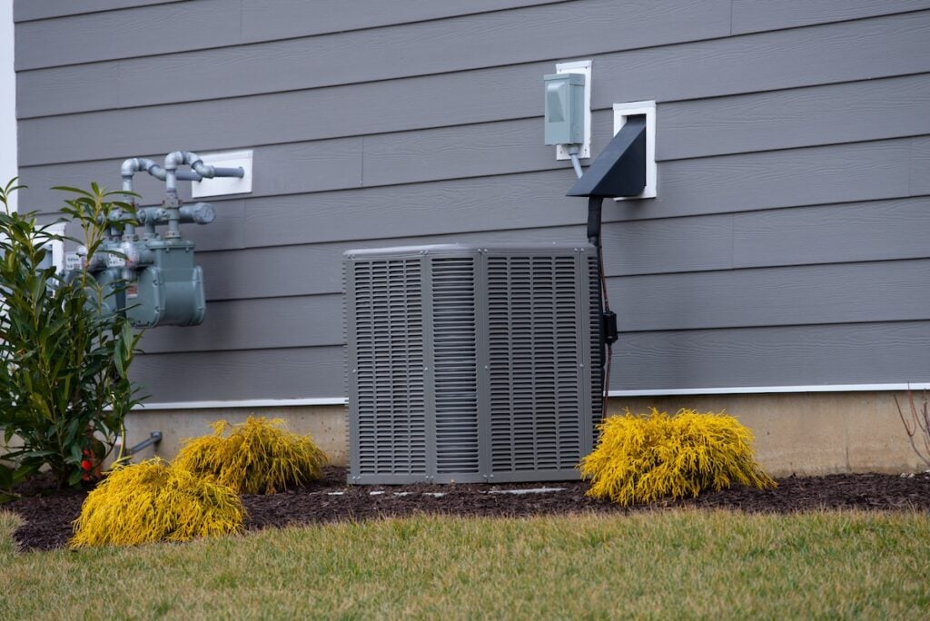 air conditioner near the new house cold fan install supply system wall climate ac condenser