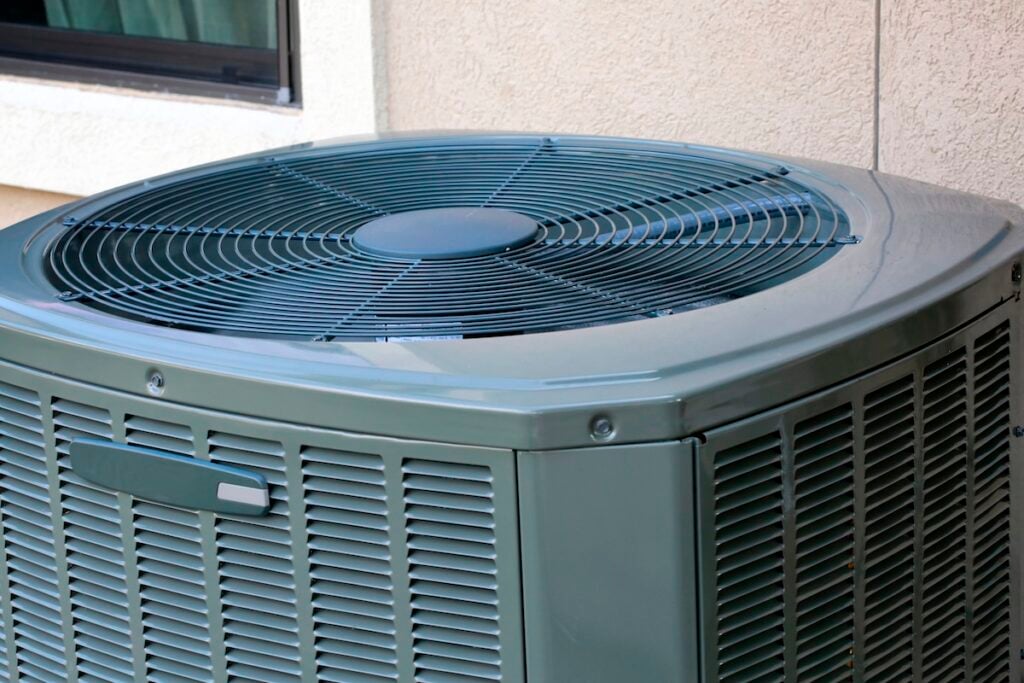 Close up of High efficiency modern AC-heater unit garage air conditioner
