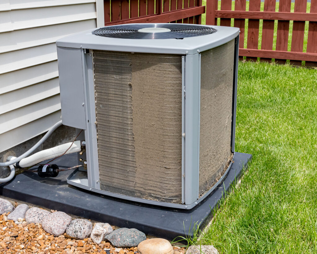 Air conditioning unit on grass