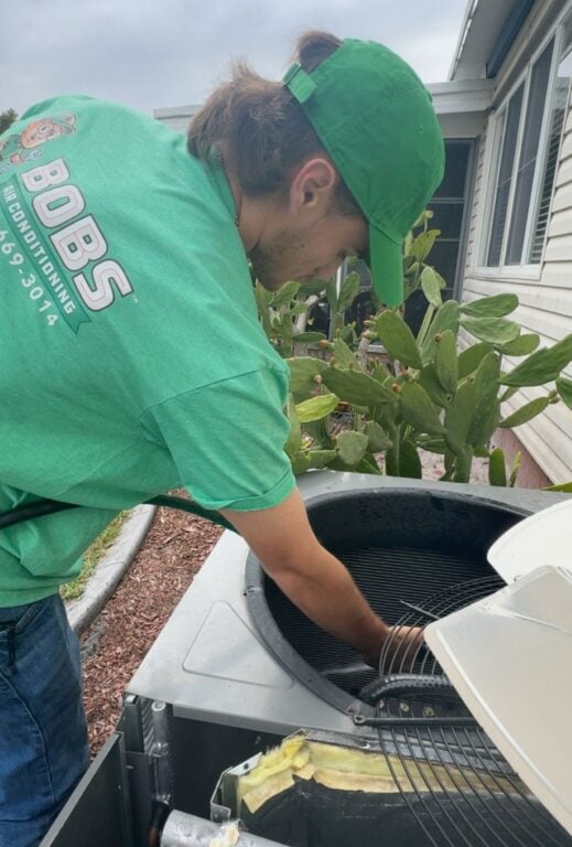 Bob's AC worker installing AC