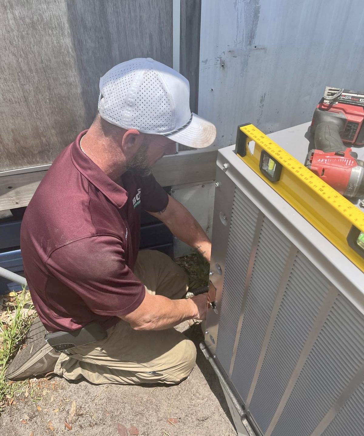Bob's AC worker repairing AC