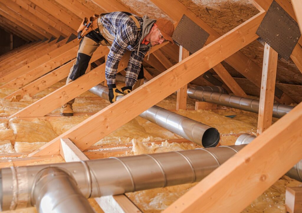 duct work lady lake fl man installing new pipes